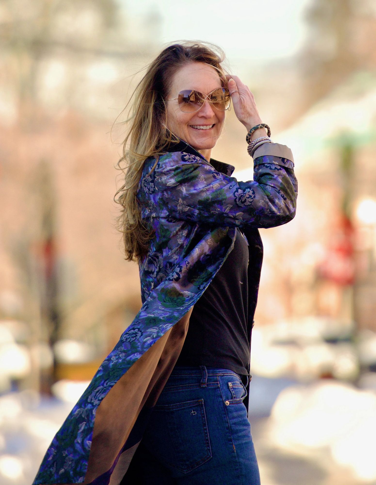 Denise Jonasz, owner of Pure Couture, in a brocade coat on Mechanic Street